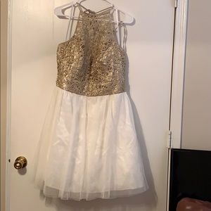 Gold and white tulle and lace detailing dress